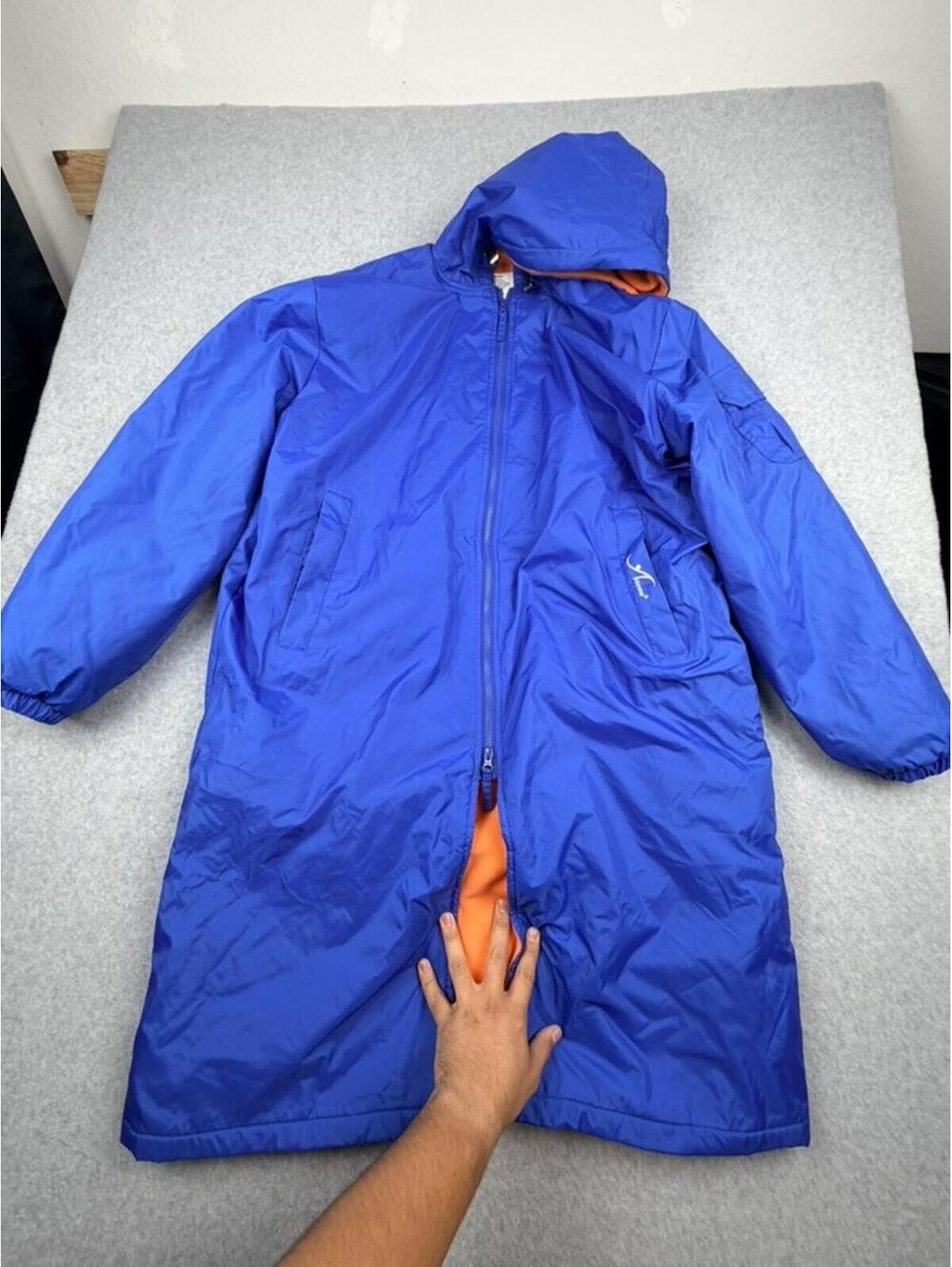 Fleece Lined Water And Wind Resistant Hooded Jacket.